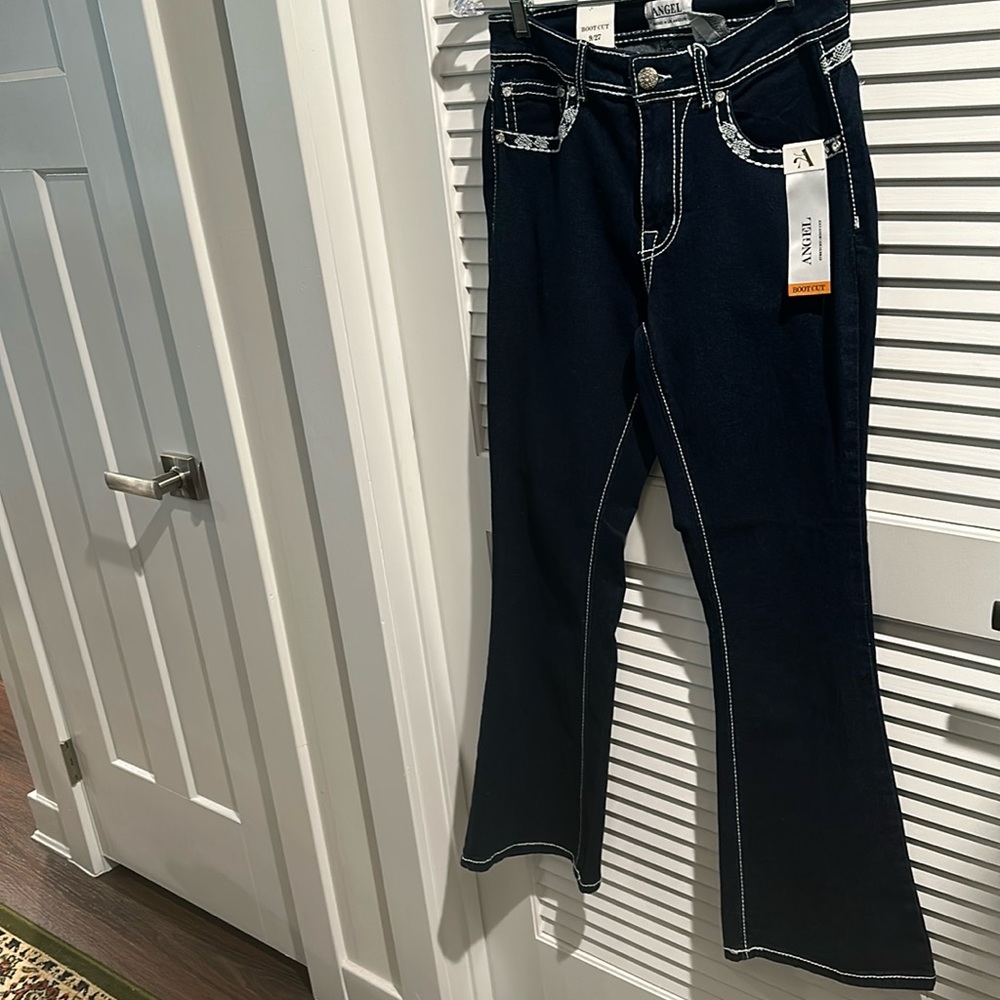 NWT Angel Blue Signature Jeans with five pockets and jeweled on backpockets.